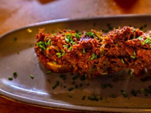 Discover the authentic flavors of Cuba with our Ropa Vieja