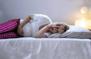 Explore causes and remedies for stomach pain during pregnancy, ensuring