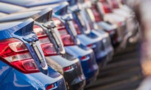 Explore how new tariff policies impact US auto insurers, creating