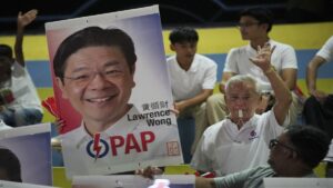 Explore the landslide victory of Singapore's People's Action Party, securing