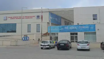 Mersin'de KYK Yenişehir Erkek Öğrenci Yurdu binasının dış görünümü; 2026-2027 GSB yurt izin rehberi