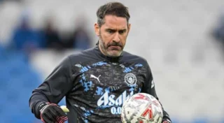 Scott Carson Bids Farewell to Manchester City